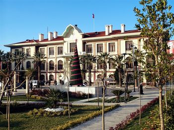 View of buildings against clear blue sky