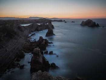 Scenic view of sea against sky during sunset