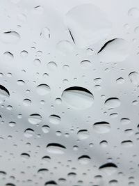 Close-up of water drops on glass