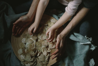 Midsection of man holding food