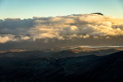 Scenic view of mountains against sky during sunset