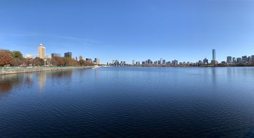 Buildings in boston against clear blue sky 
