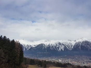 Scenic view of snowcapped mountains against sky