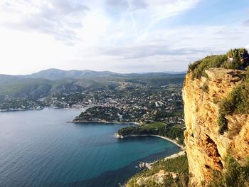 Scenic view of sea against cloudy sky