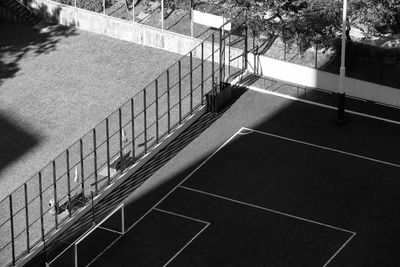 High angle view of soccer field on sunny day