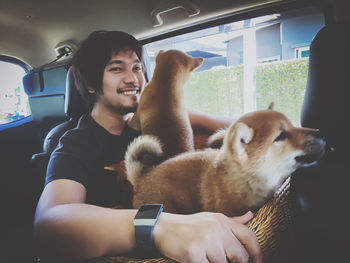 Side view of a dog in car