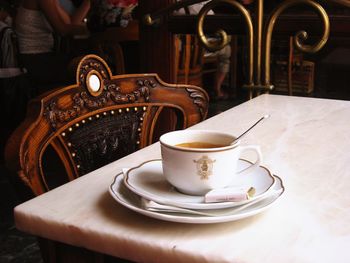 Coffee cup on table in cafe