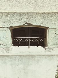 Close-up of window on wall of building