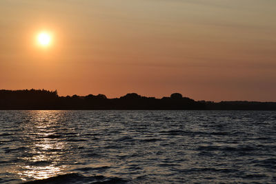 Scenic view of sunset over sea