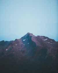 Scenic view of mountains against clear sky