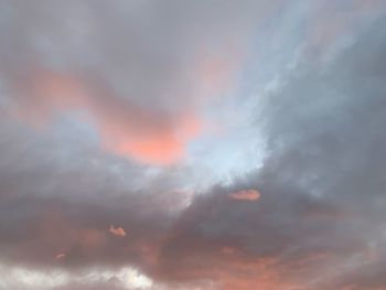 Low angle view of dramatic sky during sunset