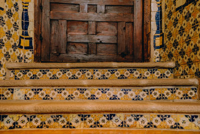 Closed wooden door of old building