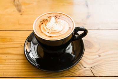 High angle view of coffee on table