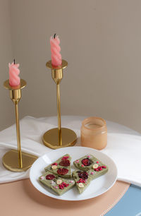 Close-up of cake served on table