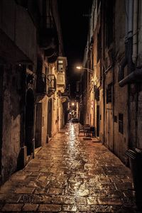 Illuminated buildings in city at night