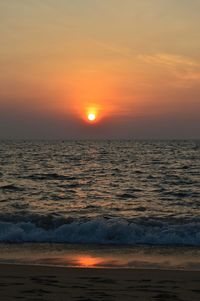 Scenic view of sea at sunset