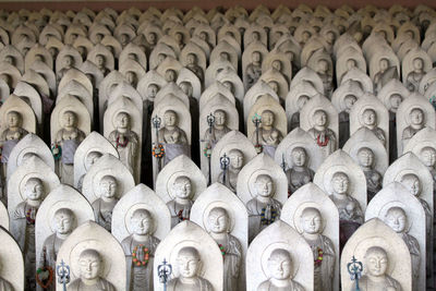 Full frame shot of carvings on white wall