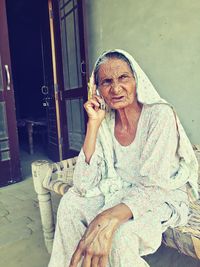 Portrait of senior woman talking on mobile phone