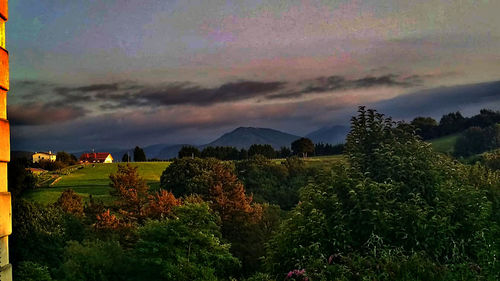 Scenic view of landscape against sky during sunset