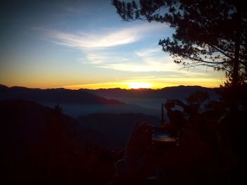 Scenic view of mountains at sunset