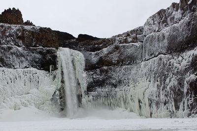 View of waterfall against the sky