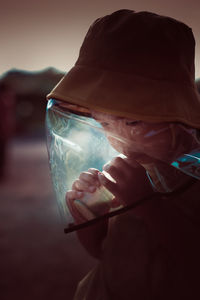 Portrait of man drinking water