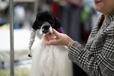 Man holding dog