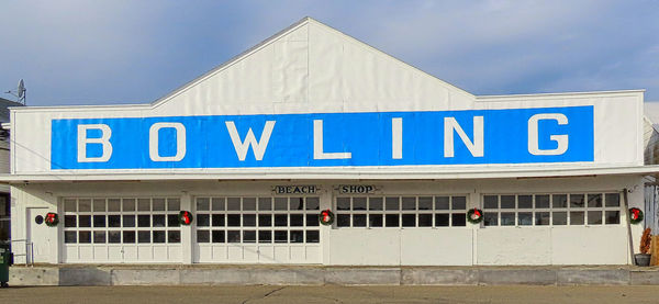 Information sign on building against sky