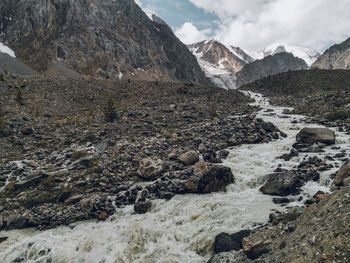 Scenic view of rocky mountains against sky