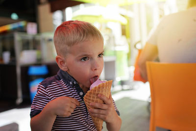 Portrait of boy eating ice cream