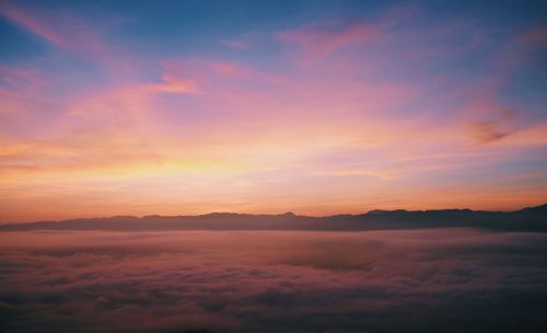 Scenic view of dramatic sky during sunset