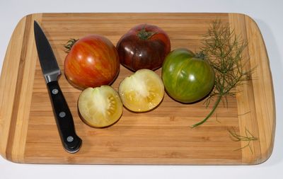 High angle view of fruits on cutting board