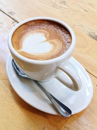 High angle view of cappuccino on table