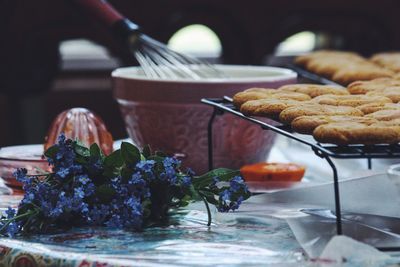 Close-up of cookies with flower on table