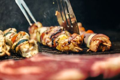 Close-up of meat on barbecue grill