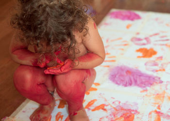 Girl playing with paints