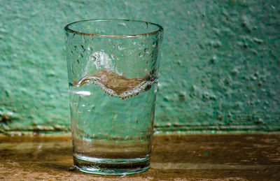 Close-up of water in glass on table
