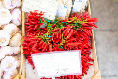 High angle view of red chili peppers for sale at market stall