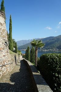 View of calm lake against mountain range