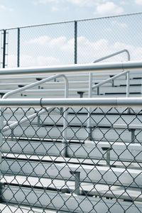 Full frame shot of chainlink fence against sky