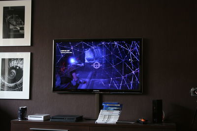 Illuminated lighting equipment on table at home