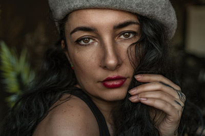 Close-up of young woman looking away