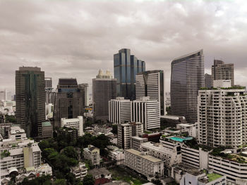 High angle view of buildings in city against sky