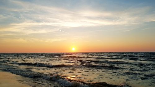 Scenic view of sea against sky during sunset