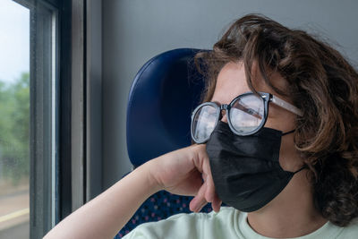 Portrait of woman wearing mask