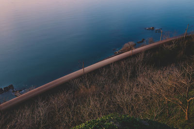 High angle view of sea shore against sky