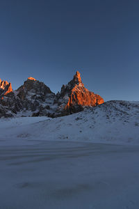 Italy, dolomities unesco heritage. scenic view of snowcapped  montains against clear sky. 