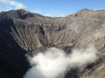 Scenic view of volcanic mountain against sky