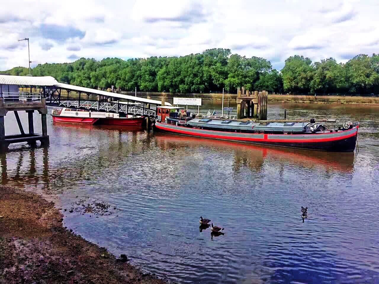 water, sky, boat, mode of transport, tree, cloud - sky, nature, rippled, cloud, tranquility, outdoors, day, tranquil scene, no people, scenics, cloudy, beauty in nature, idyllic, non-urban scene