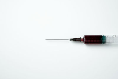 Close-up of pen against white background